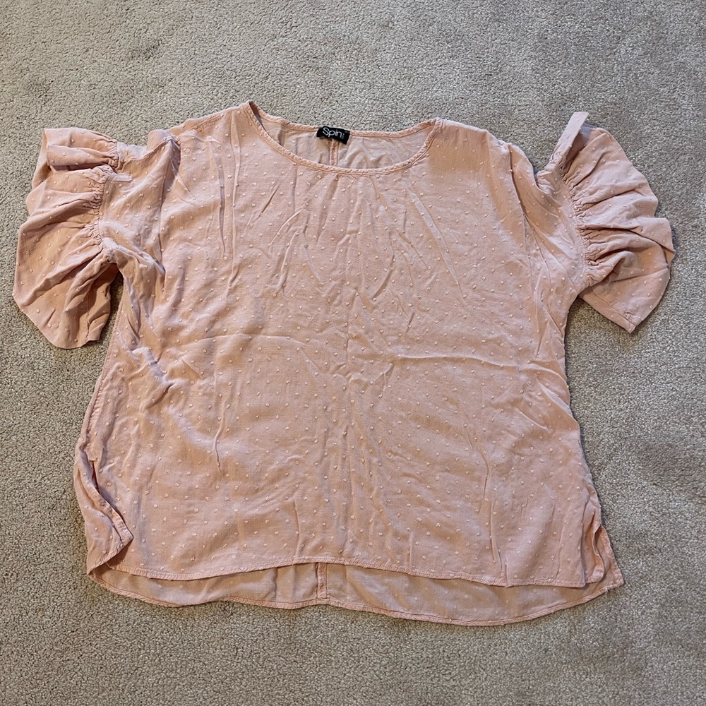 Pink on pink polka dot shirt